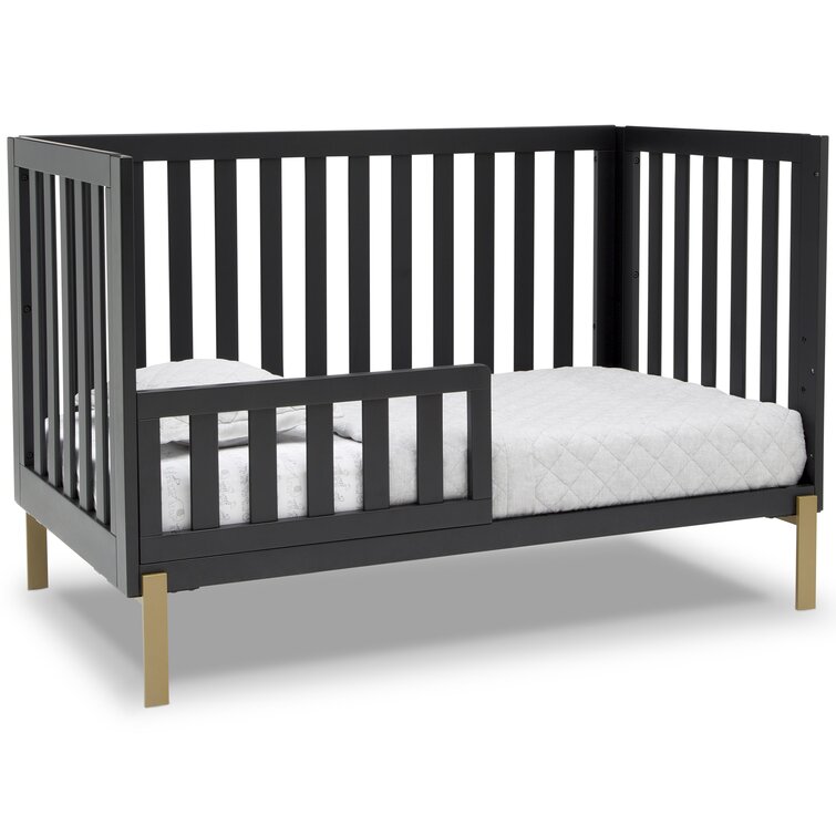 Delta crib guard outlet rail